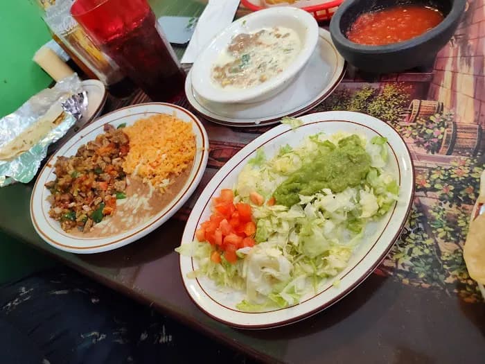Warm cheese dip served with a fajita platter