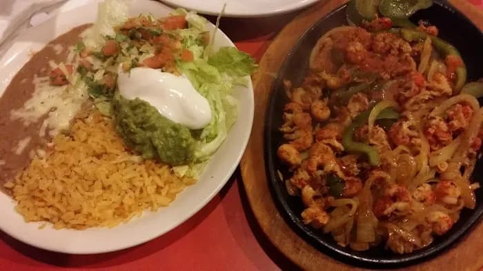 Sizzling seafood skillet with peppers at Coco Loco